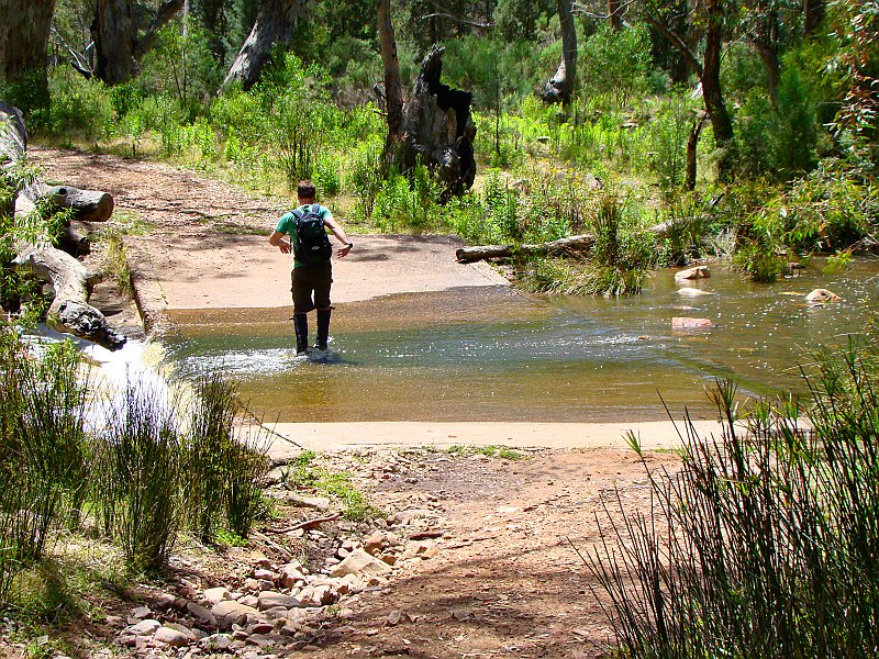 6080_Hiker_crossing_creek.JPG